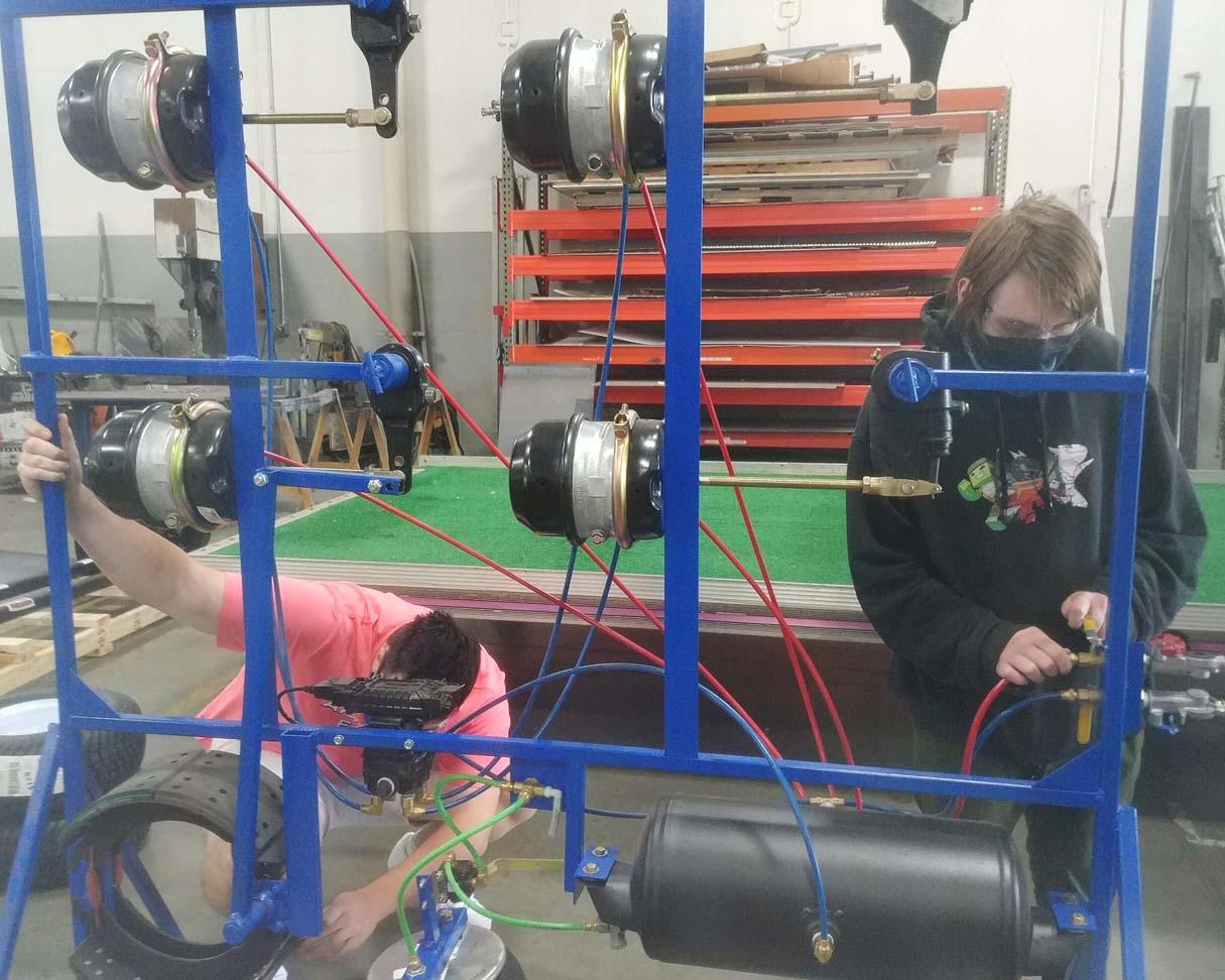 students working on a trainer