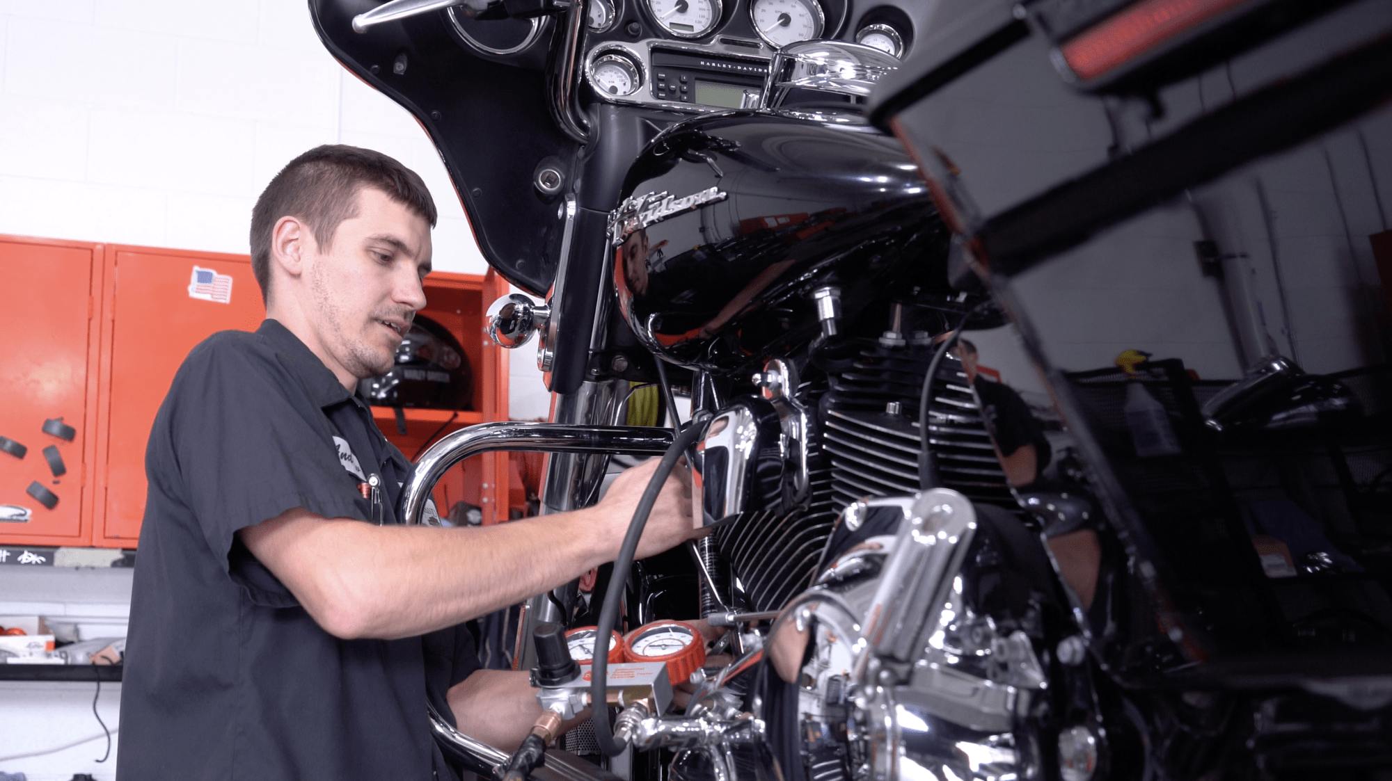 Motorcycle technician fixing a motorcycle